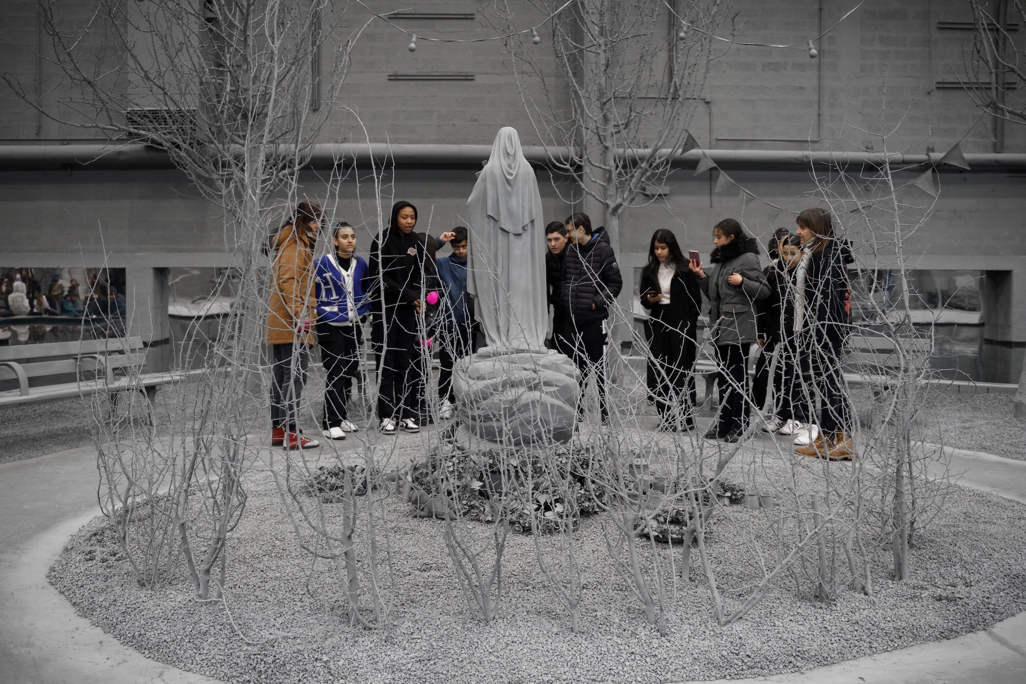 Visitors find themselves inside an art installation completely clad in grey.