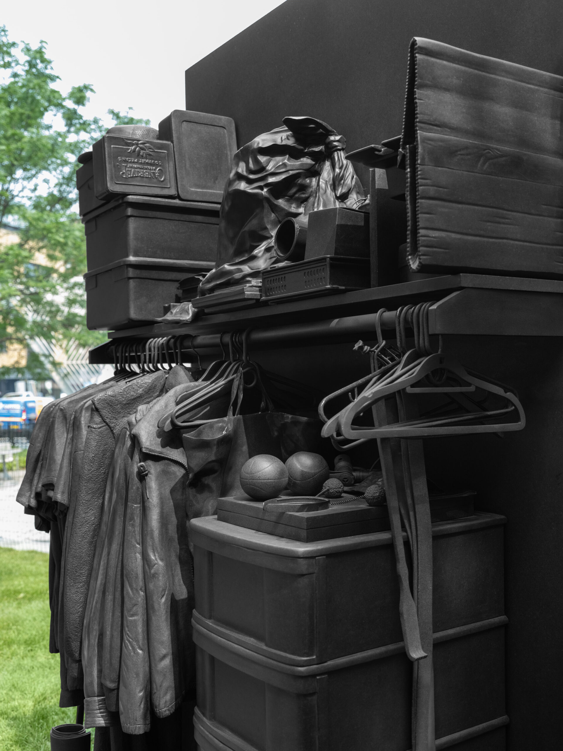 A detail of a granite sculpture in the New York City AIDS Memorial Park of a bedroom closet by Jim Hodges.
