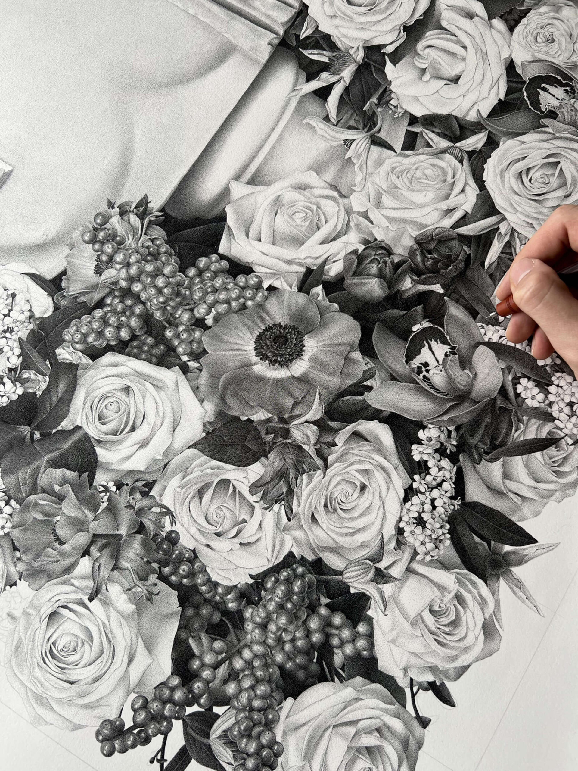 A stippled ink drawing of detailed flowers.