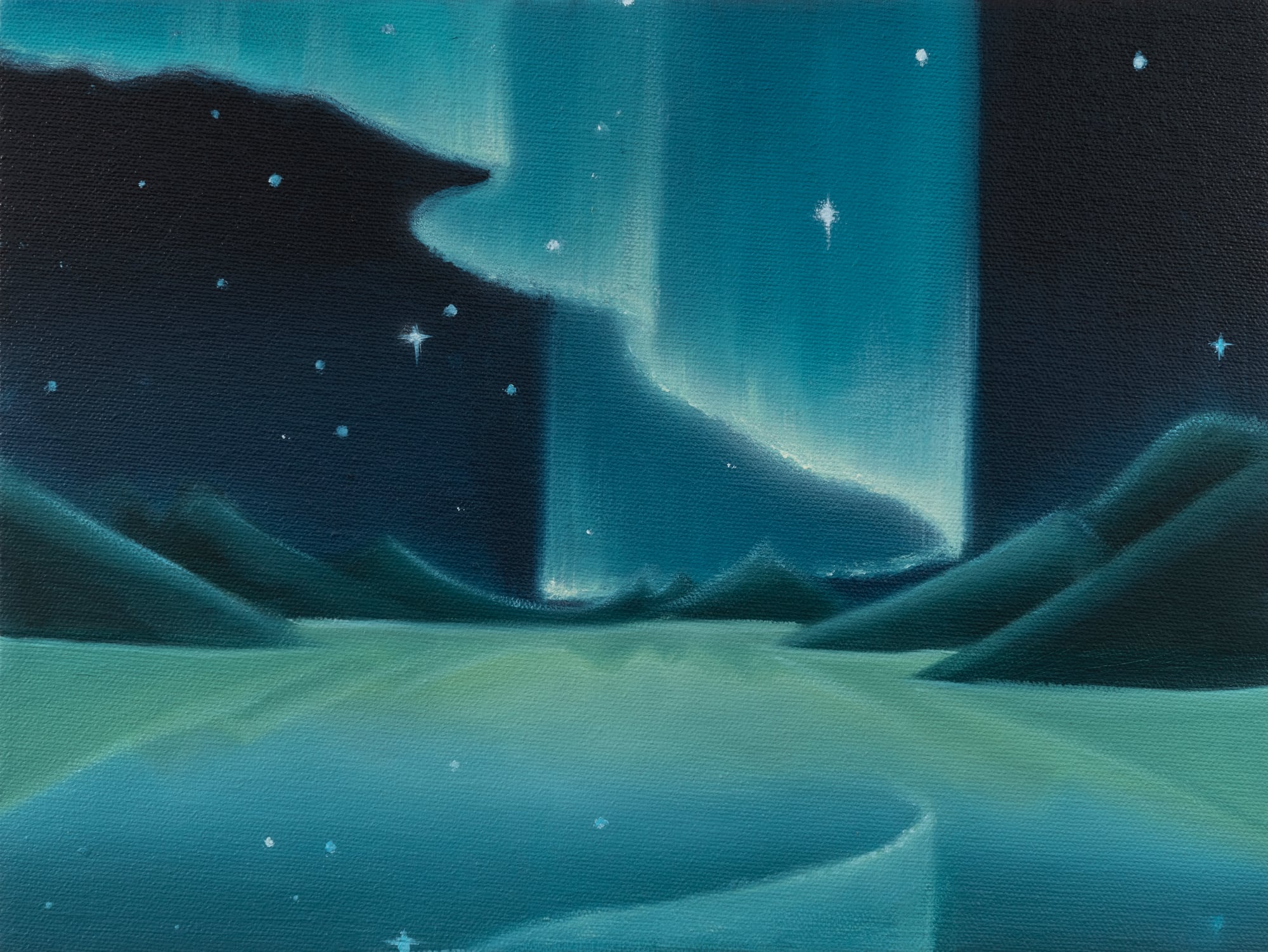 A curtain like expanse of norther lights glows above a quiet landscape
