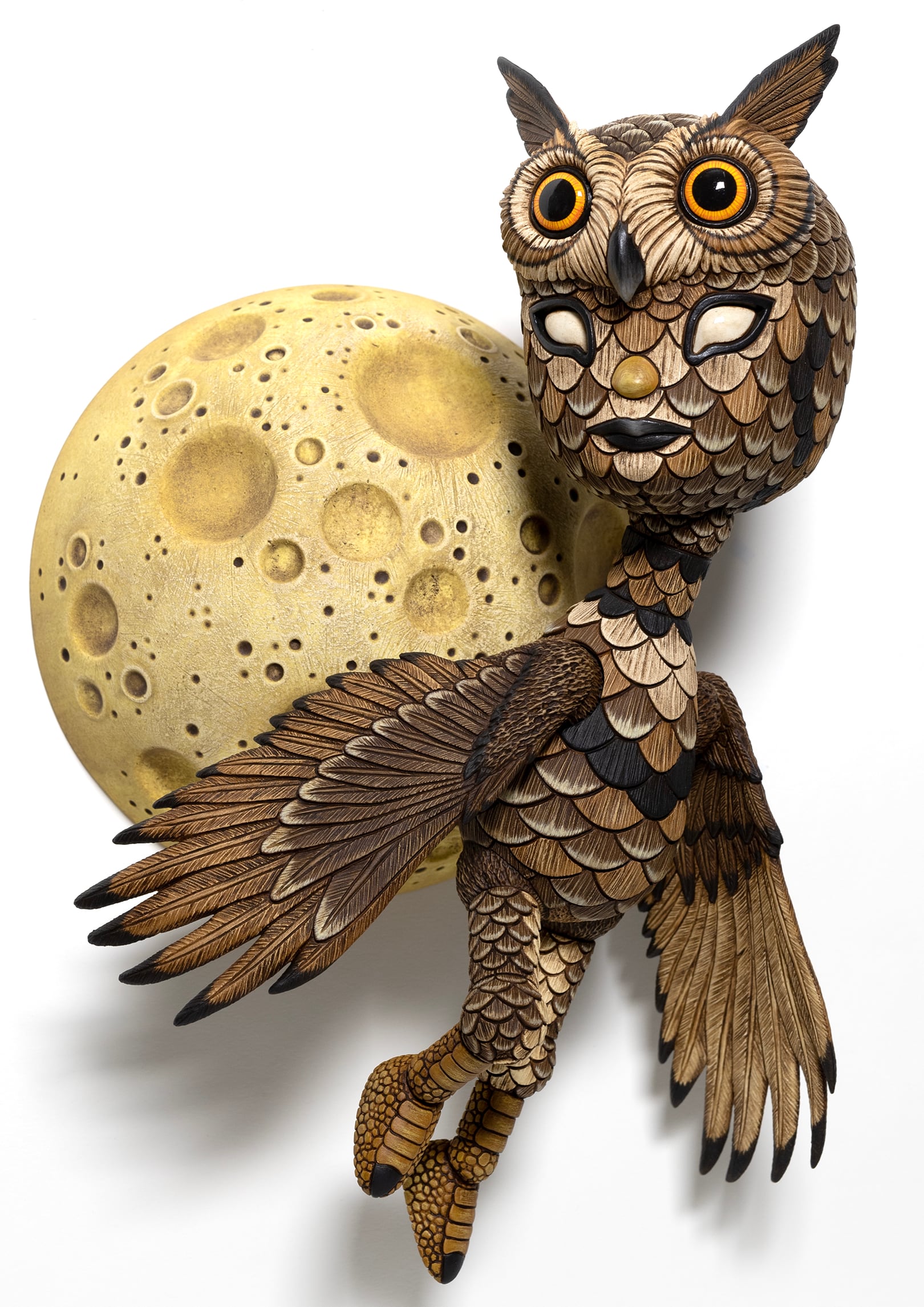 A ceramic sculpture of a figure camouflaged as an owl.