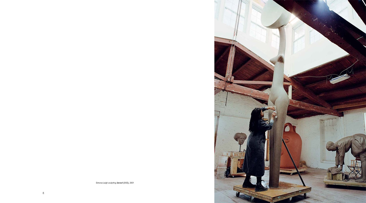 an open book spread with an image of simone leigh working on a tall figurative sculpture