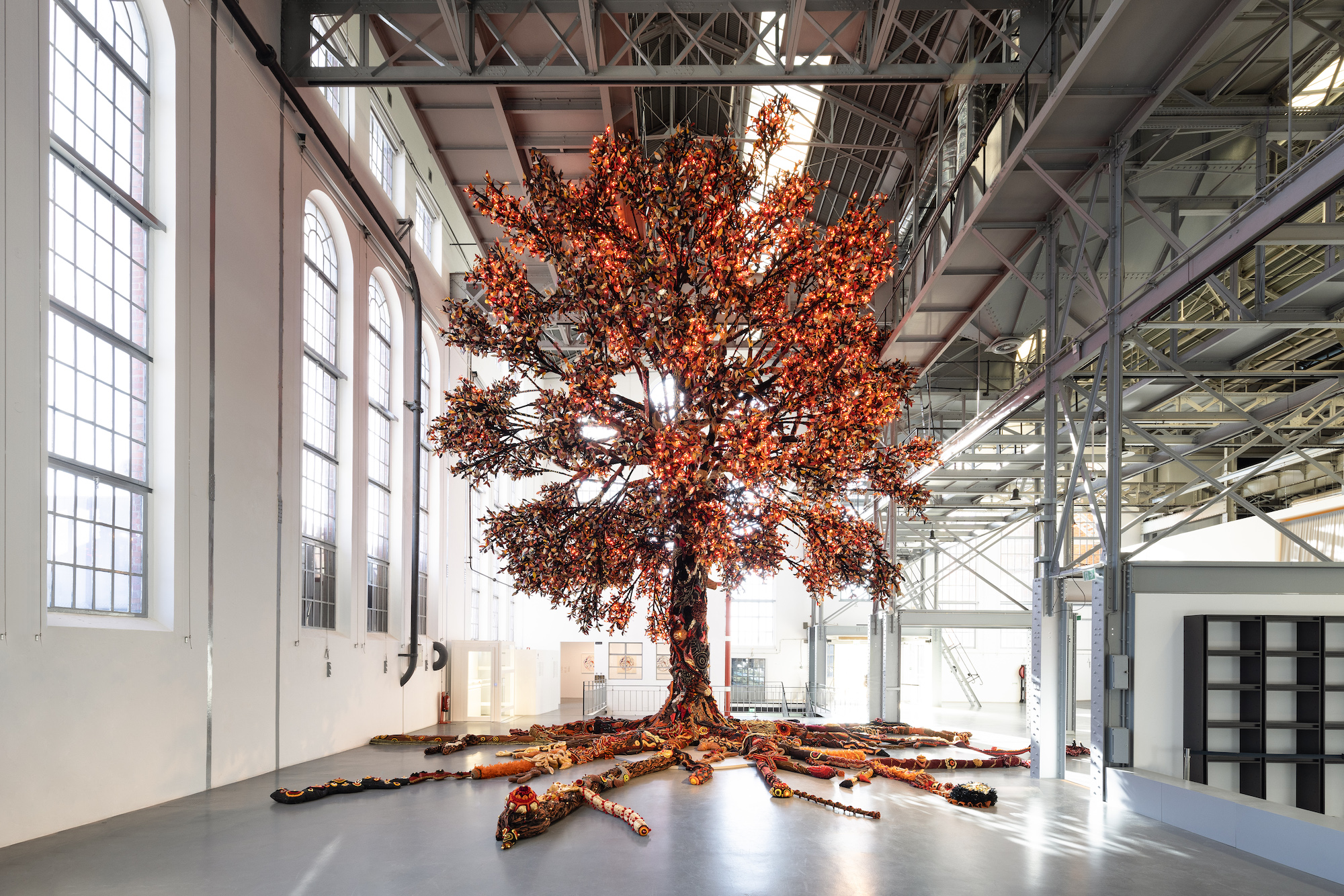 An installation view of a tree sculpture made from fabric.
